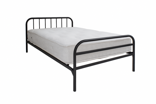 Black metal bed frame with white mattress on a white background