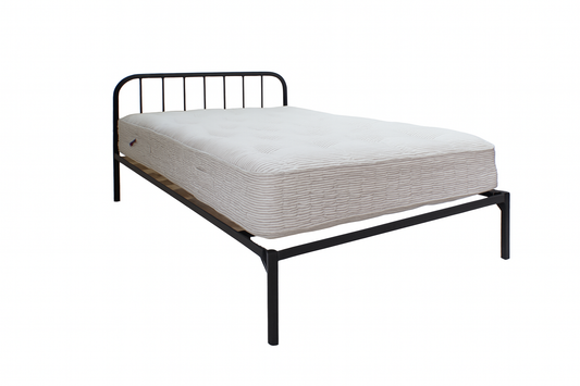 Black metal bed frame with a mattress on a white background